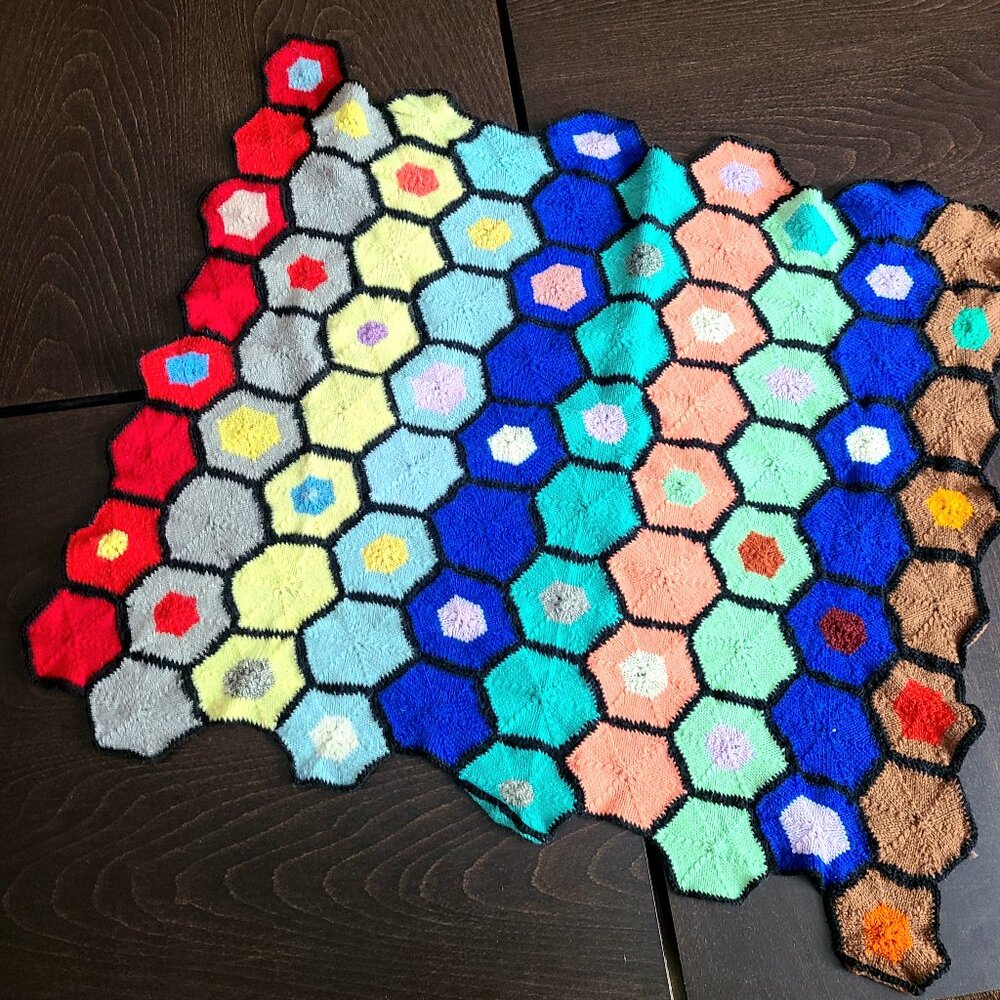 Hand made knitted crochet multicolored coffee table cloth.